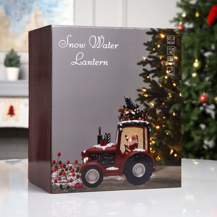 Decoratiune Craciun tip Tractor cu Mos Craciun, brad si cadouri, functie muzicala, zapada in miscare, 25 × 13 × 21 cm