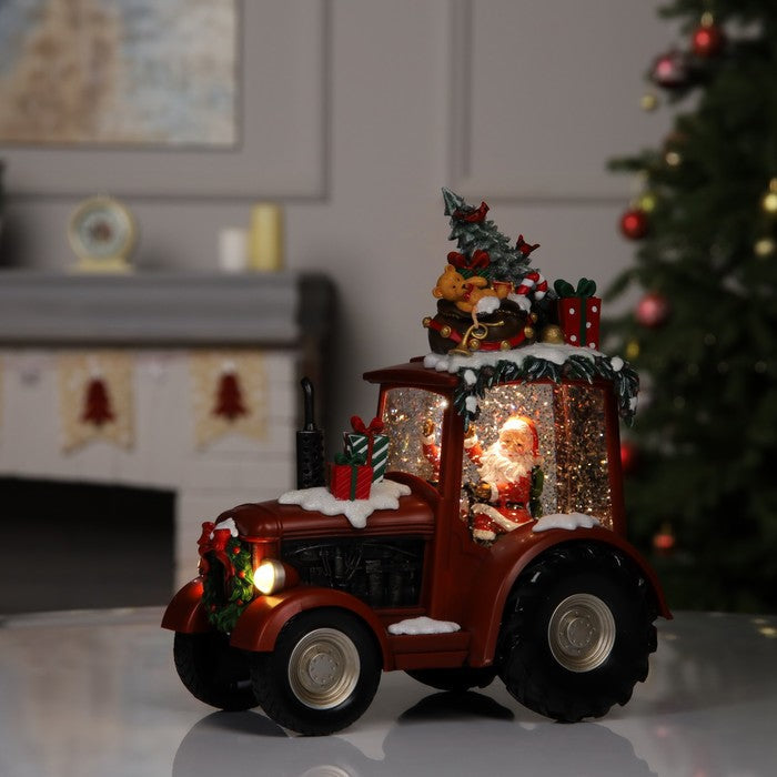 Decoratiune Craciun tip Tractor cu Mos Craciun, brad si cadouri, functie muzicala, zapada in miscare, 25 × 13 × 21 cm