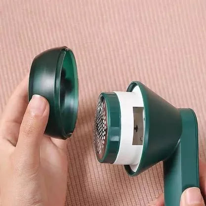 Aparat electric pentru curatat scame
