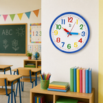 Ceas de perete pentru copii, educativ, cu cifre colorate și limbi în formă de creioane 25cm