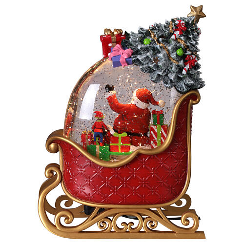 Lampa decorativa Craciun cu Mos Craciun in sanie, lumina si 8 melodii festive